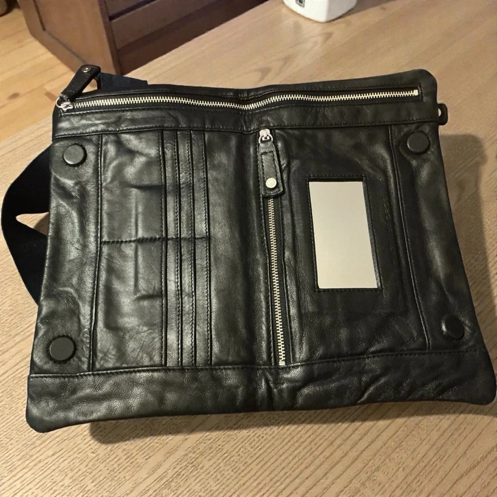 BCBGMaxAzria Black Soft Leather Folding Wristlet Clutch